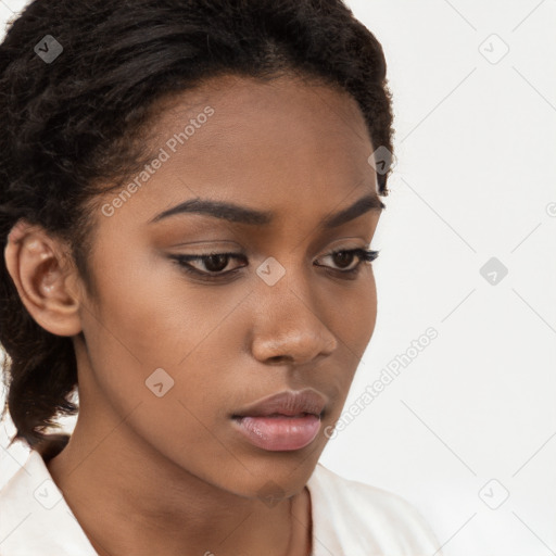 Neutral black young-adult female with long  brown hair and brown eyes