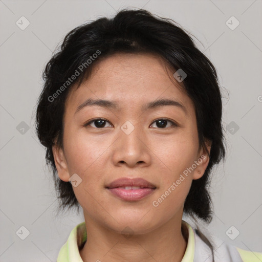 Joyful asian young-adult female with medium  brown hair and brown eyes