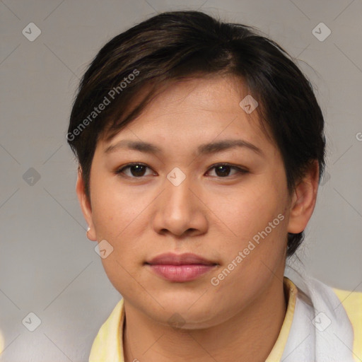 Joyful asian young-adult female with short  brown hair and brown eyes