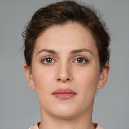 Neutral white young-adult female with short  brown hair and brown eyes