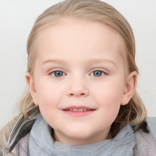 Joyful white child female with medium  brown hair and blue eyes