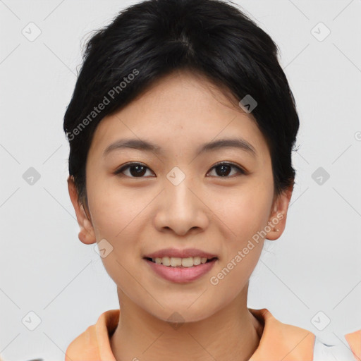 Joyful asian young-adult female with short  black hair and brown eyes