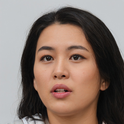 Neutral asian young-adult female with medium  black hair and brown eyes