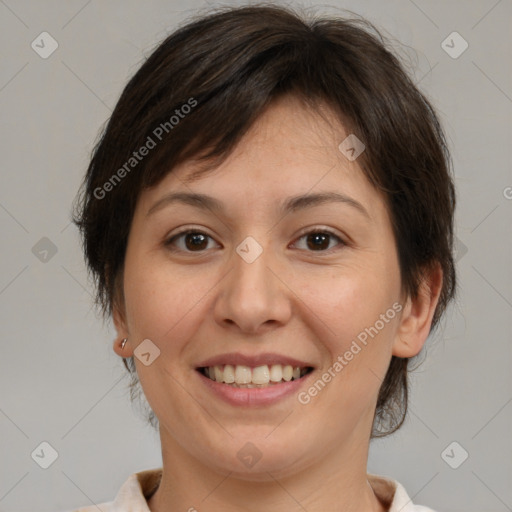 Joyful white adult female with medium  brown hair and brown eyes