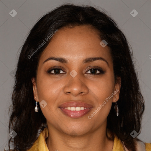 Joyful black young-adult female with long  brown hair and brown eyes