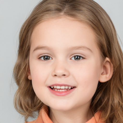 Joyful white child female with medium  brown hair and brown eyes