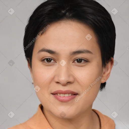 Joyful asian young-adult female with short  brown hair and brown eyes