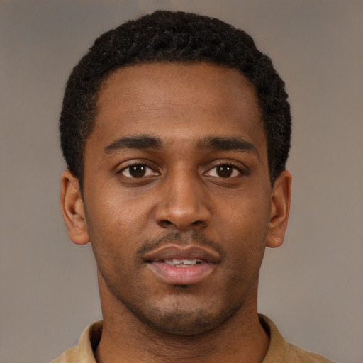 Neutral black young-adult male with short  brown hair and brown eyes