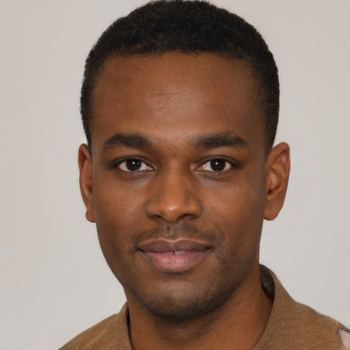 Neutral black young-adult male with short  black hair and brown eyes