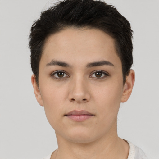 Neutral white young-adult female with short  brown hair and brown eyes