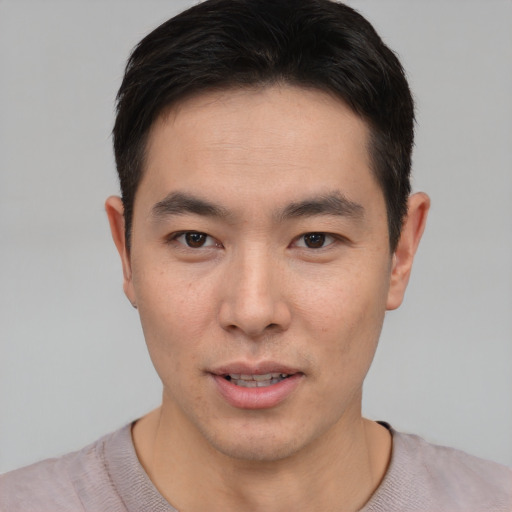 Neutral asian young-adult male with short  brown hair and brown eyes