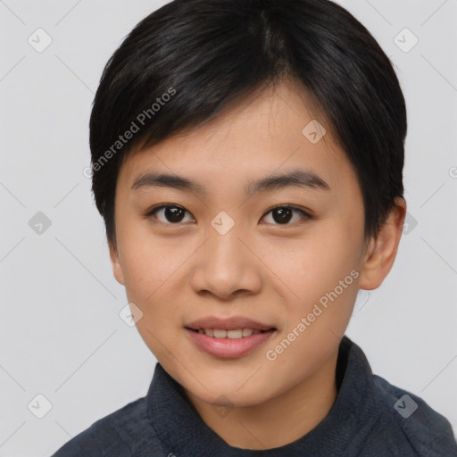 Joyful asian young-adult female with short  black hair and brown eyes