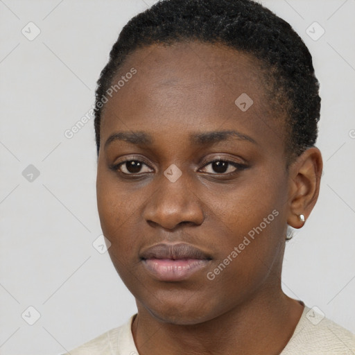 Neutral black young-adult female with short  brown hair and brown eyes