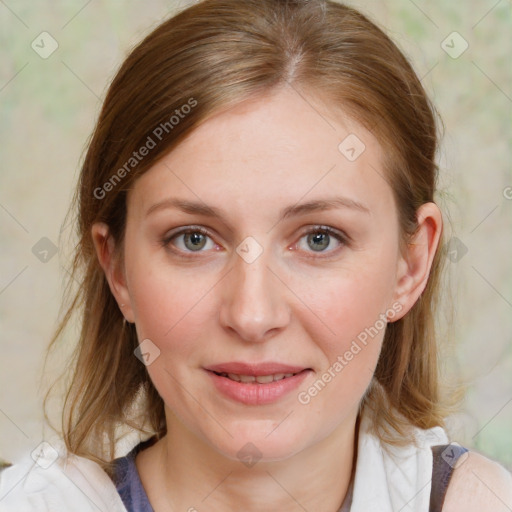 Joyful white young-adult female with medium  brown hair and blue eyes