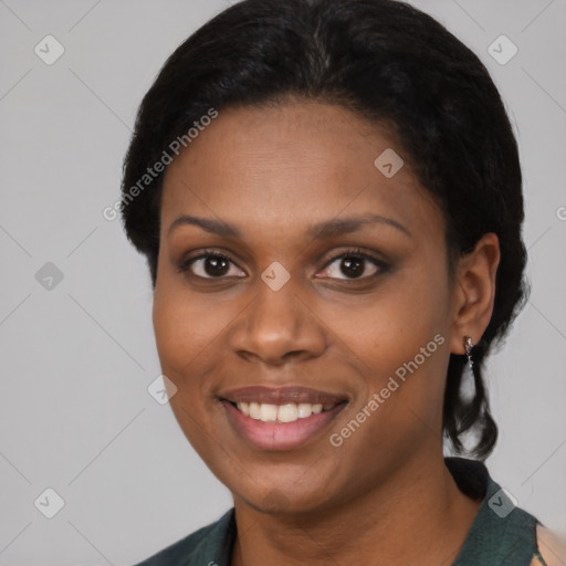 Joyful black young-adult female with medium  black hair and brown eyes