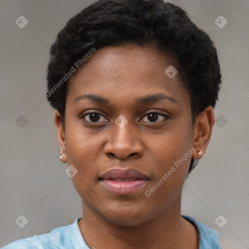 Joyful black young-adult female with short  black hair and brown eyes