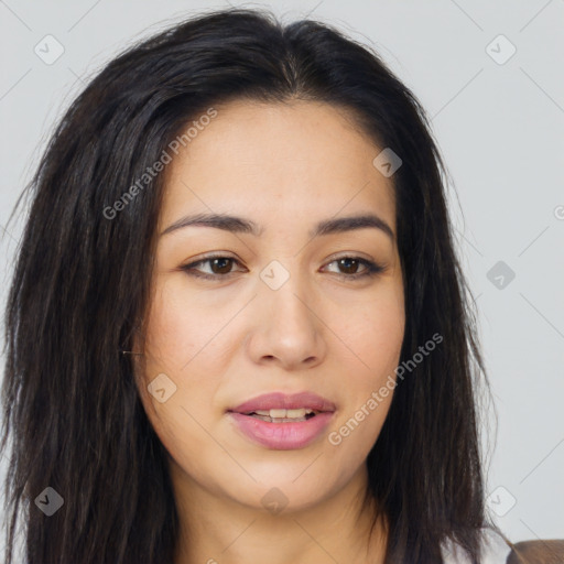 Joyful asian young-adult female with long  brown hair and brown eyes