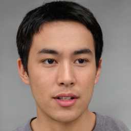 Neutral asian young-adult male with short  brown hair and brown eyes