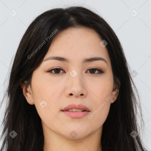 Joyful asian young-adult female with long  brown hair and brown eyes