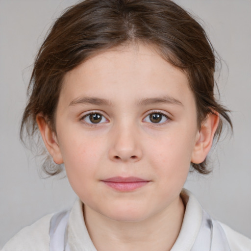 Joyful white child female with medium  brown hair and brown eyes