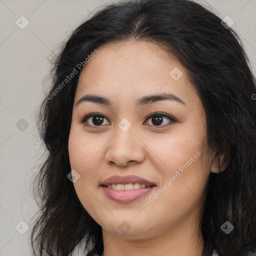 Joyful asian young-adult female with long  brown hair and brown eyes