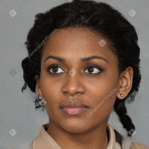 Neutral black young-adult female with short  black hair and brown eyes