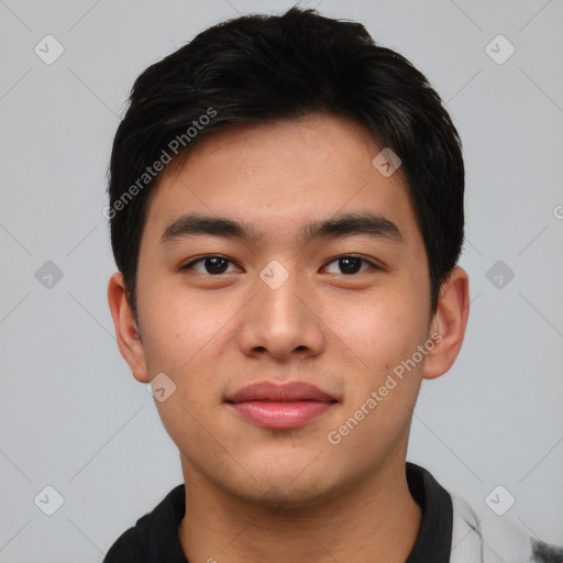 Joyful asian young-adult male with short  black hair and brown eyes