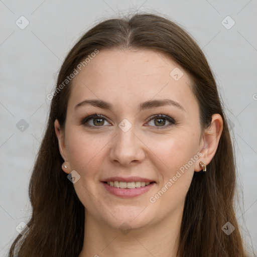 Joyful white young-adult female with long  brown hair and grey eyes