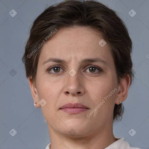 Joyful white adult female with short  brown hair and brown eyes