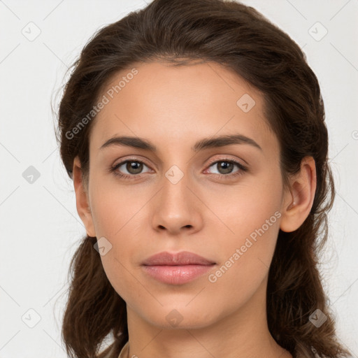 Neutral white young-adult female with long  brown hair and brown eyes