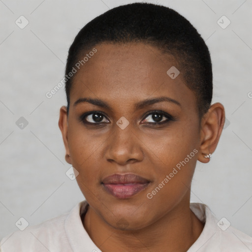 Joyful black young-adult female with short  brown hair and brown eyes