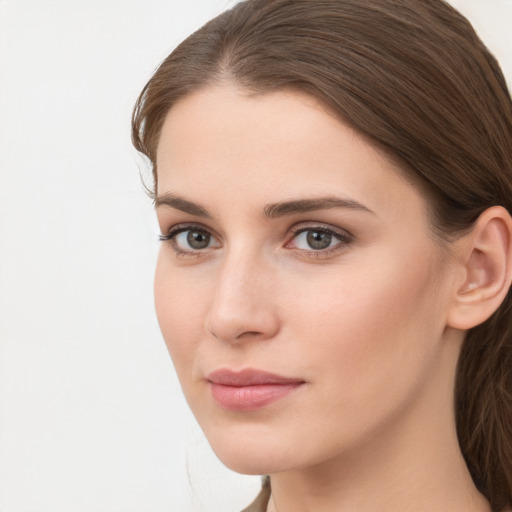 Neutral white young-adult female with long  brown hair and grey eyes