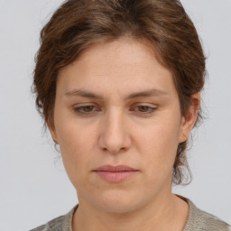 Neutral white young-adult female with short  brown hair and brown eyes