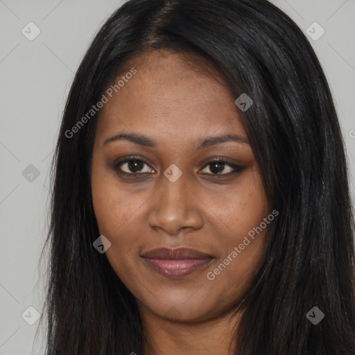 Joyful black young-adult female with long  brown hair and brown eyes