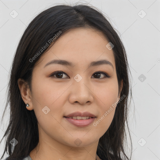 Joyful asian young-adult female with long  brown hair and brown eyes