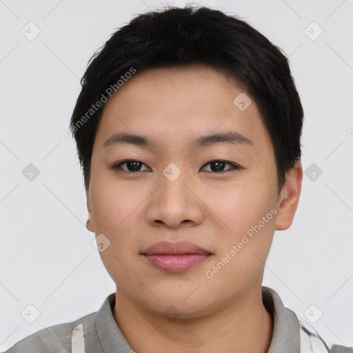 Joyful asian young-adult female with short  black hair and brown eyes