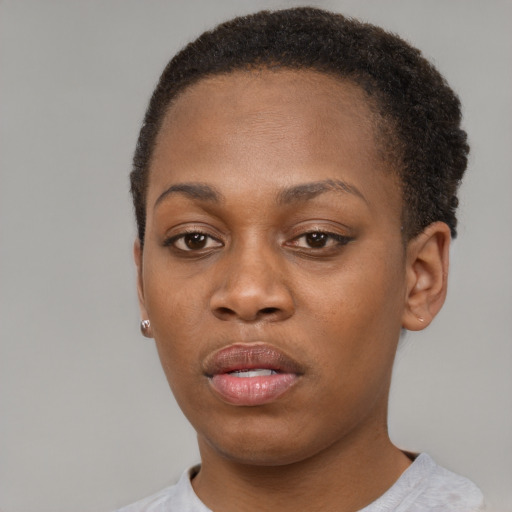 Neutral black young-adult female with short  brown hair and brown eyes