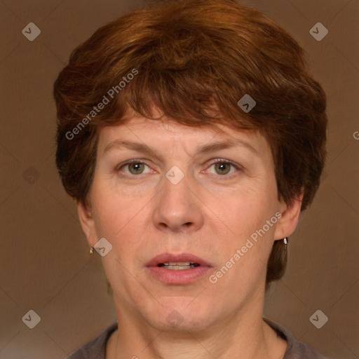 Joyful white adult female with short  brown hair and grey eyes