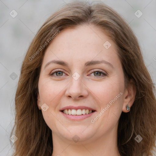 Joyful white young-adult female with long  brown hair and grey eyes