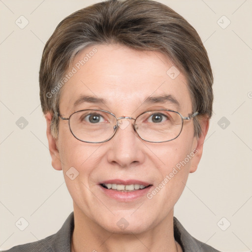 Joyful white adult female with short  brown hair and grey eyes