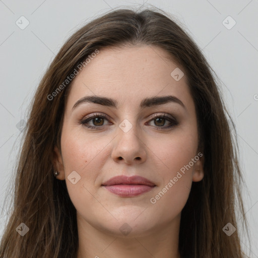 Joyful white young-adult female with long  brown hair and grey eyes