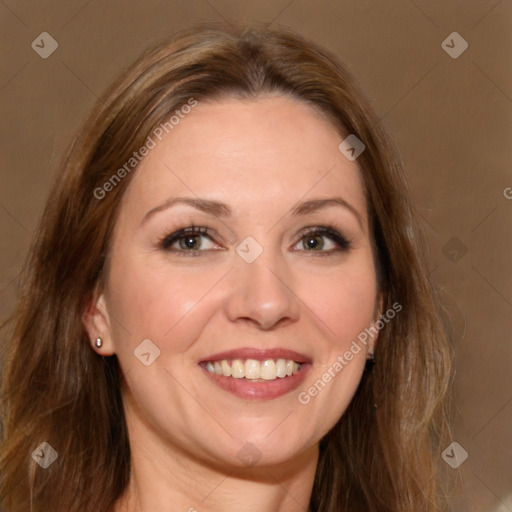 Joyful white adult female with long  brown hair and brown eyes