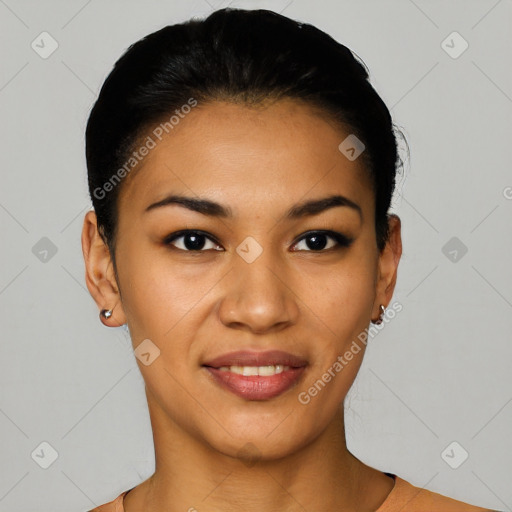 Joyful latino young-adult female with short  black hair and brown eyes