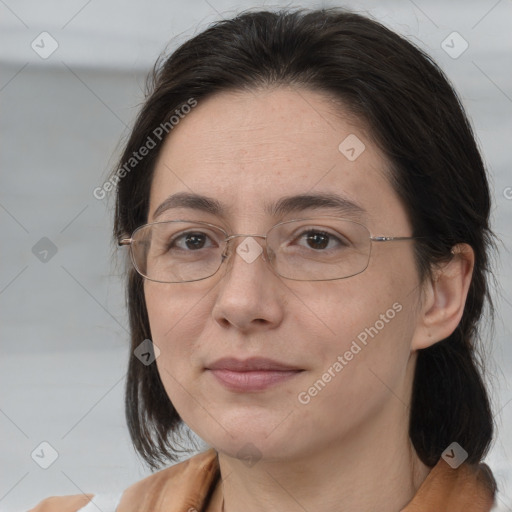 Joyful white adult female with medium  brown hair and brown eyes