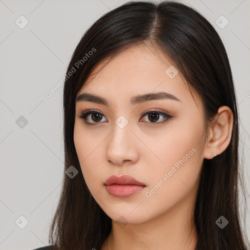 Neutral white young-adult female with long  brown hair and brown eyes