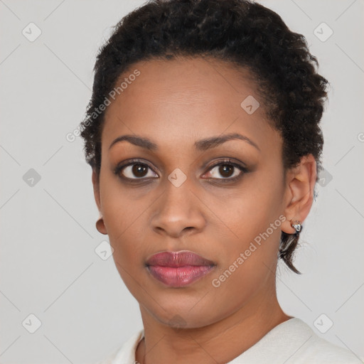 Neutral black young-adult female with short  brown hair and brown eyes