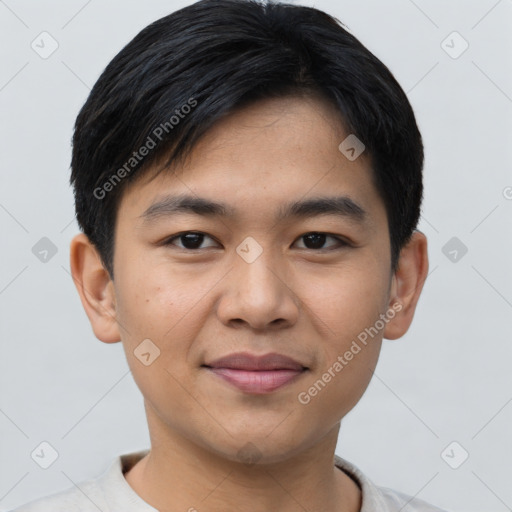 Joyful asian young-adult male with short  black hair and brown eyes