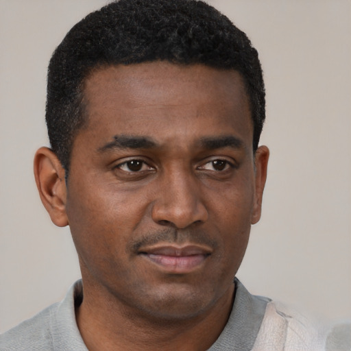 Neutral black young-adult male with short  black hair and brown eyes
