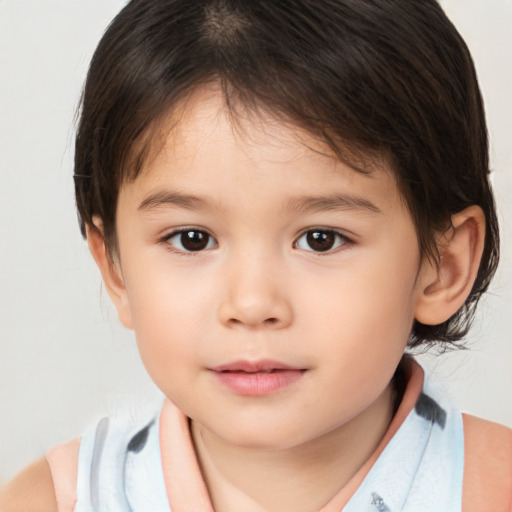 Joyful white child female with medium  brown hair and brown eyes