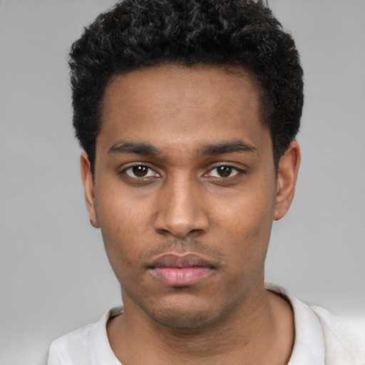 Neutral black young-adult male with short  black hair and brown eyes